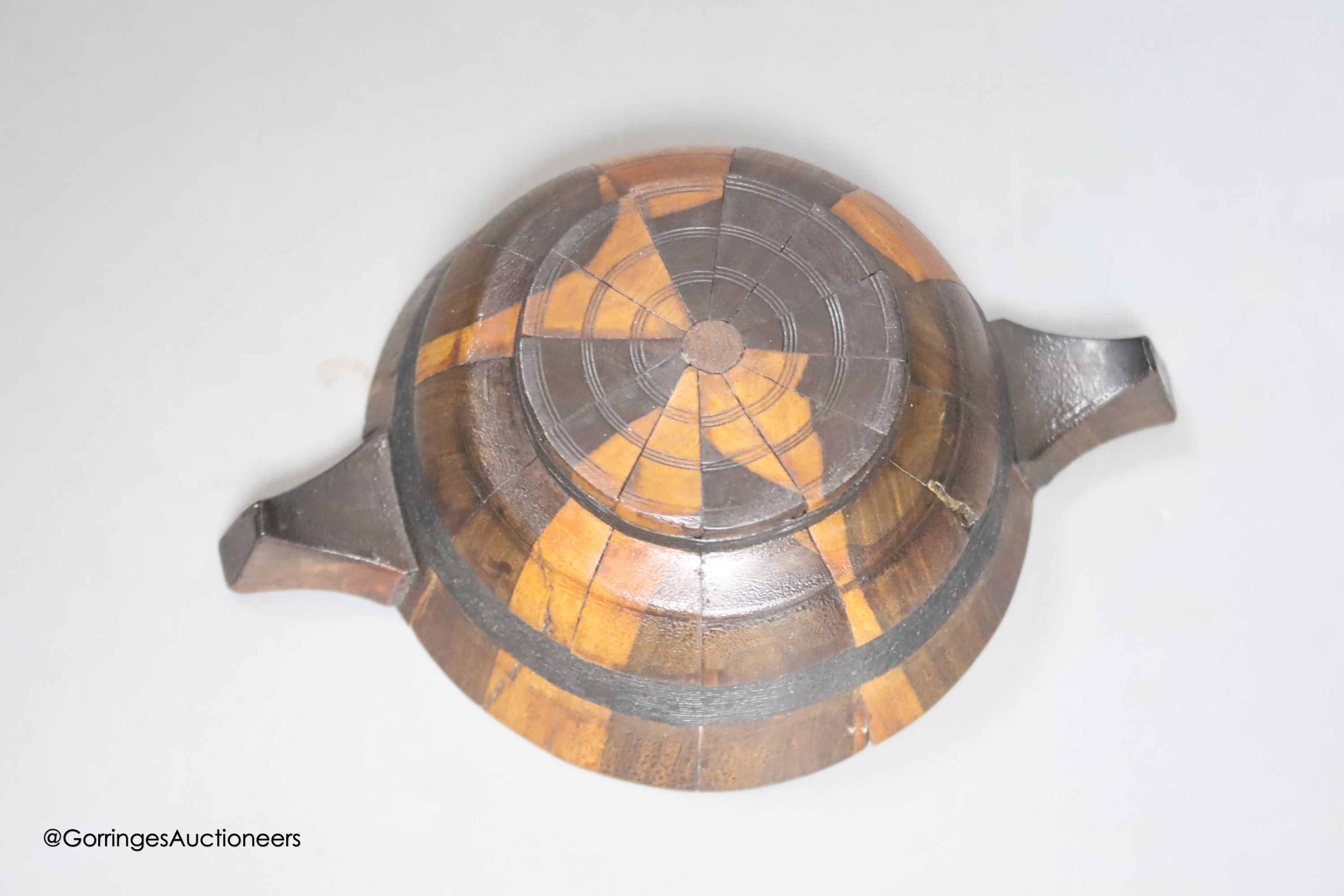 A treen quaich, Scottish, c.1900, possibly lignum vitae, length from handle to handle 16cm